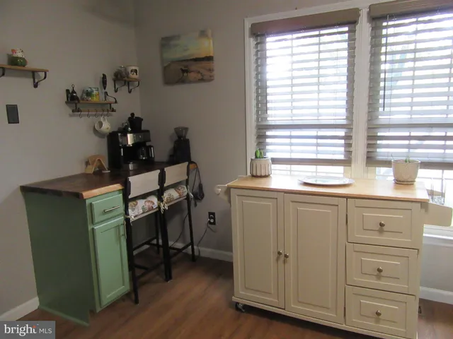 a room with cabinets and window