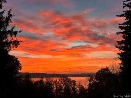 a picture of a bathroom with a shower