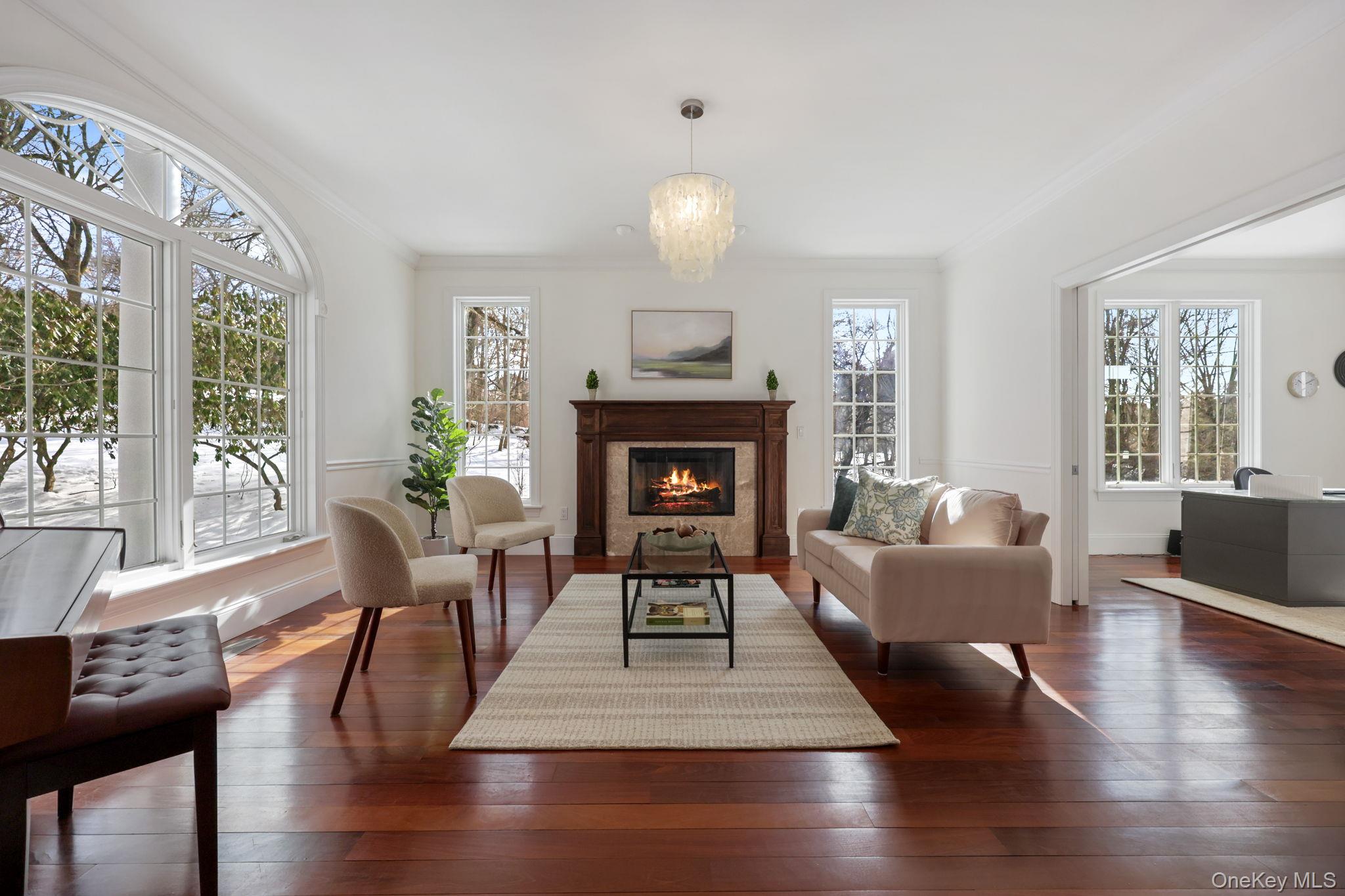 1320 Albany Post Road Croton-on-Hudson, NY 10520 - Photo 10 of 36 Spacious room with gas burning fireplace and beautiful light.
