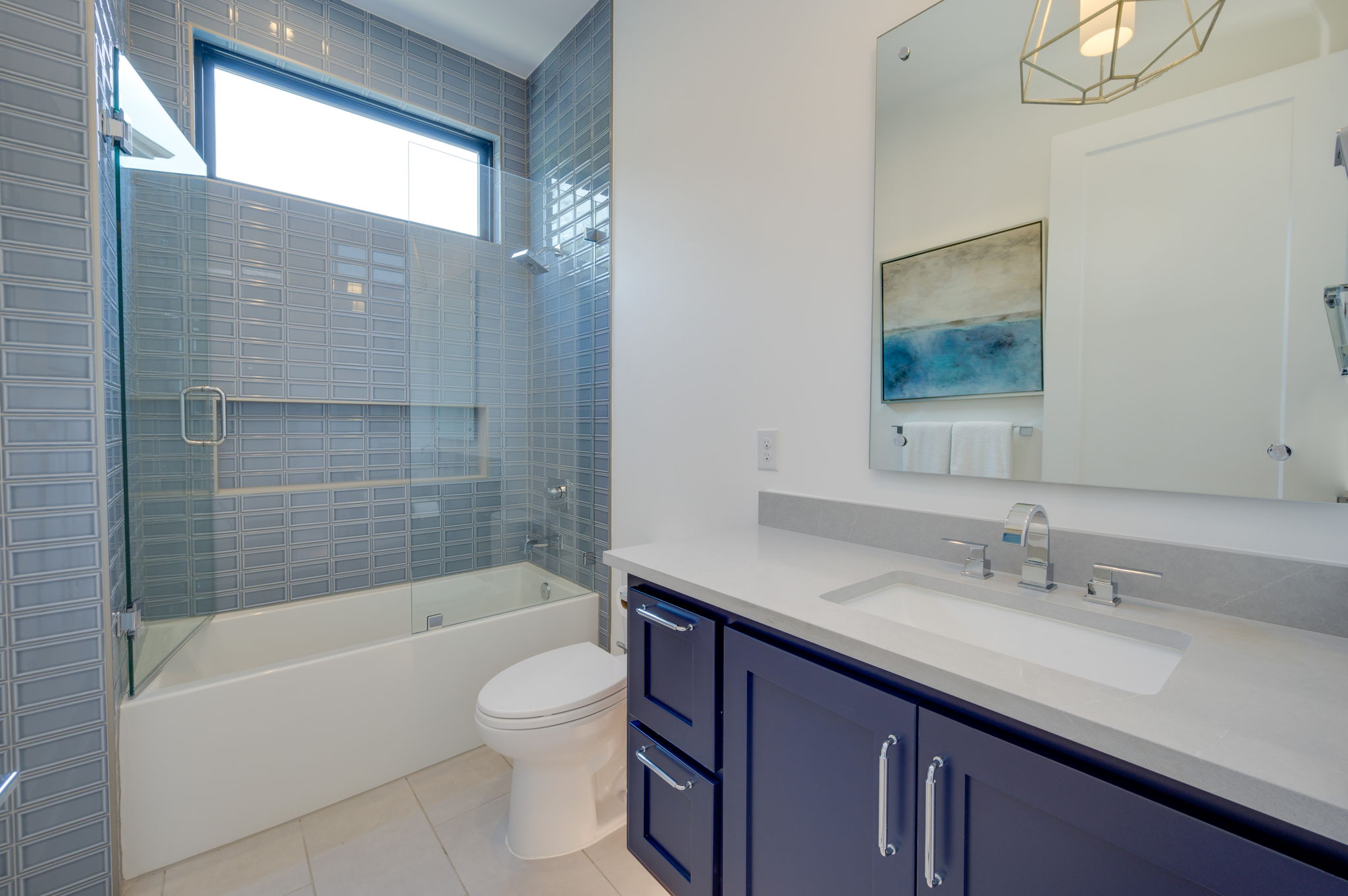 2415 McCall Road Austin, TX 78703 - Photo 8 of 40 A refined bathroom features a spacious bathtub and sleek vanity with ample storage.