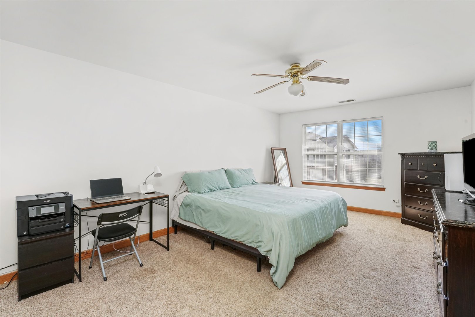 12554 Arbor Drive Alsip, IL 60803 - Photo 13 of 28 a bedroom with a bed and a flat screen tv
