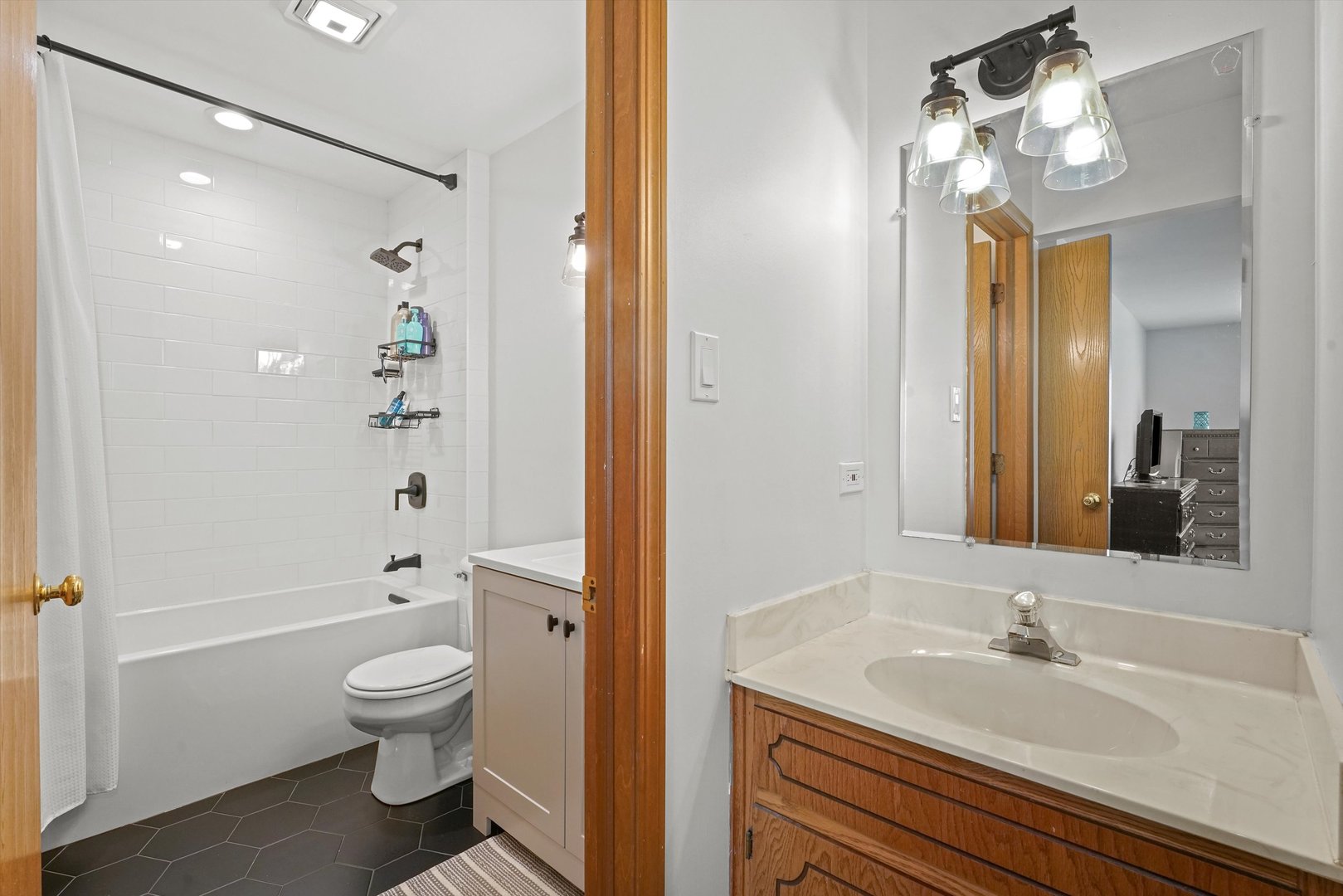 12554 Arbor Drive Alsip, IL 60803 - Photo 17 of 28 a bathroom with a sink a toilet and shower