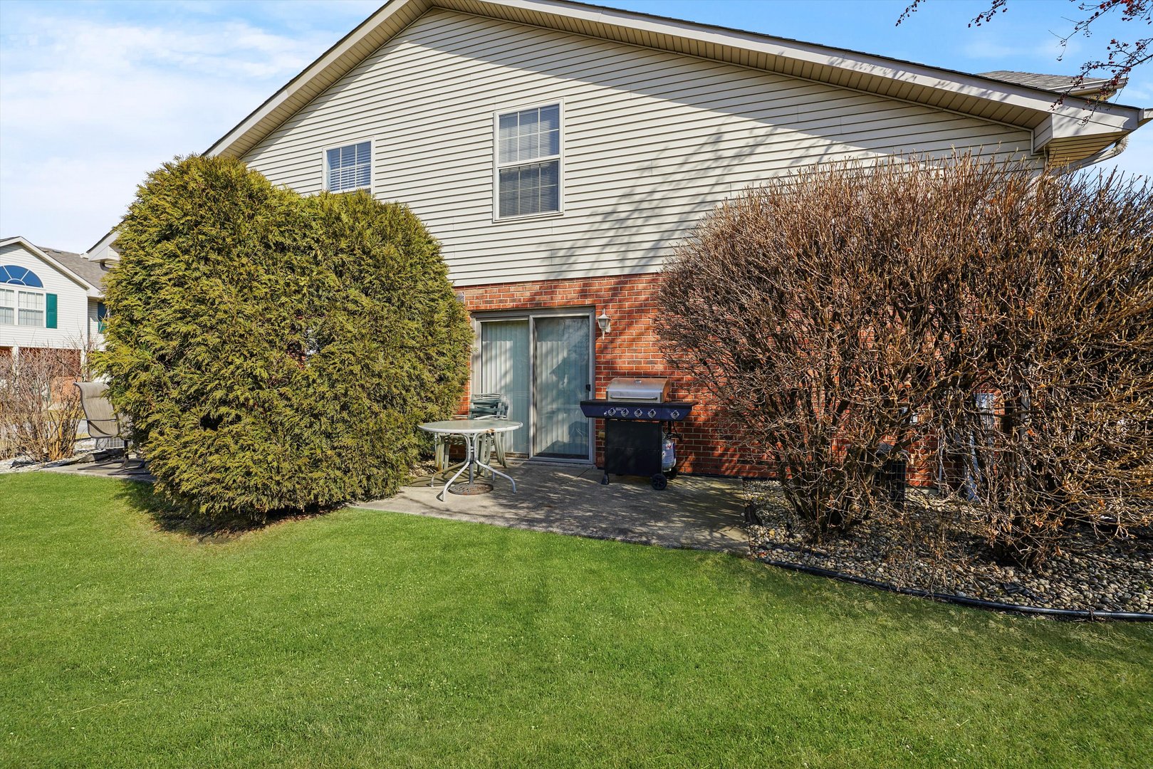 12554 Arbor Drive Alsip, IL 60803 - Photo 22 of 28 a view of a backyard with plants and large tree