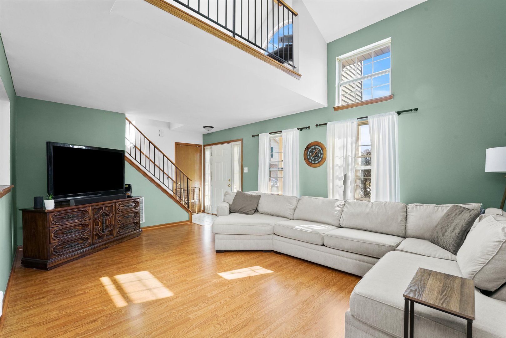 12554 Arbor Drive Alsip, IL 60803 - Photo 3 of 28 a living room with furniture and a flat screen tv