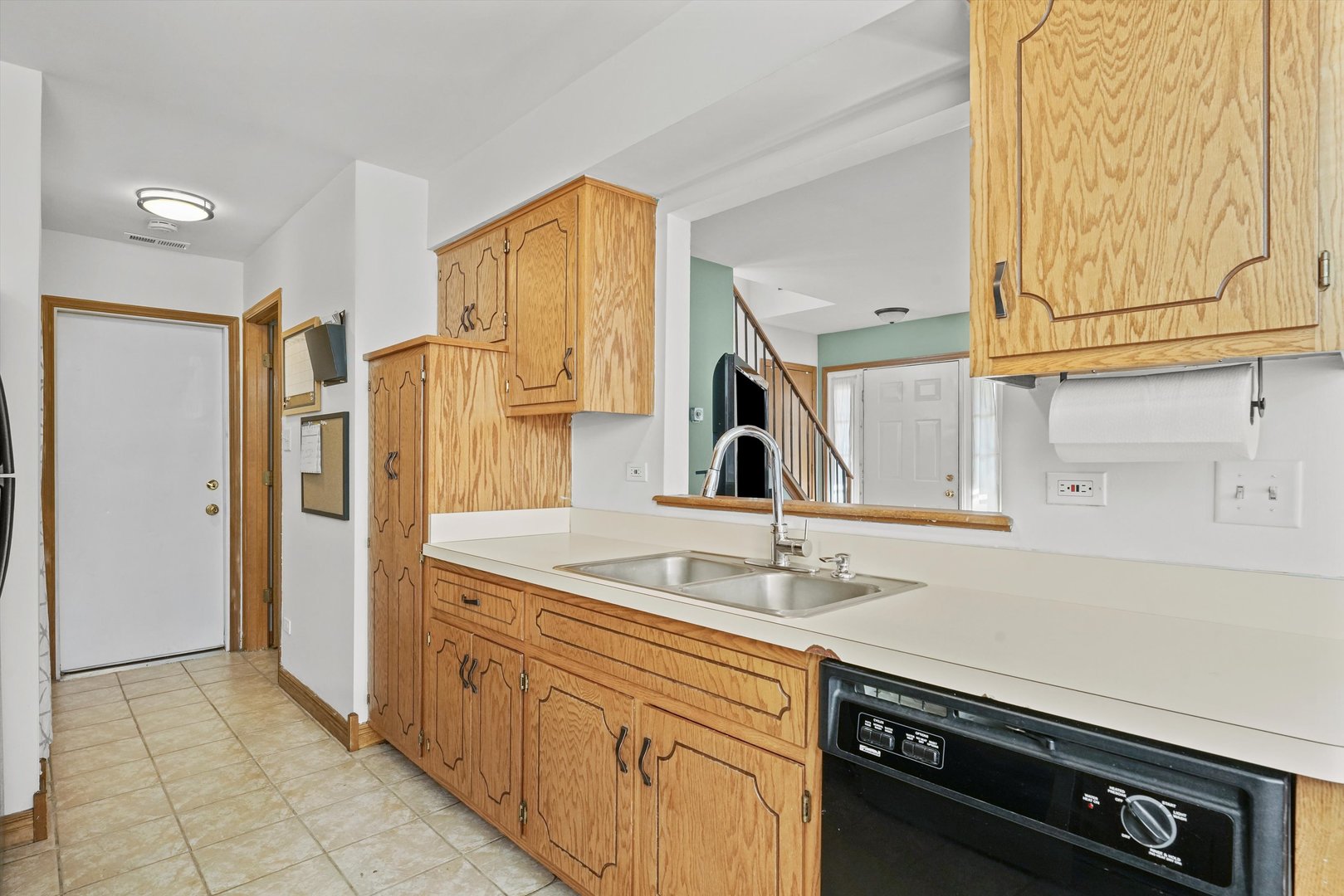 12554 Arbor Drive Alsip, IL 60803 - Photo 7 of 28 a kitchen with stainless steel appliances a sink and a stove
