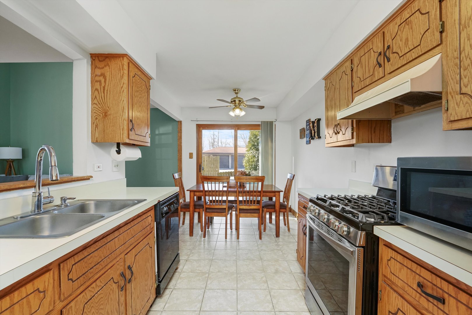 12554 Arbor Drive Alsip, IL 60803 - Photo 10 of 28 a kitchen with stove and cabinets