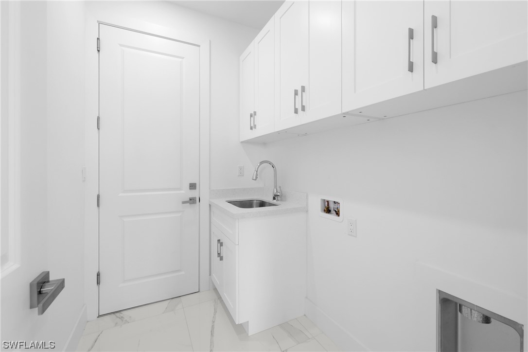 2917 Nelson Road North Cape Coral, FL 33993 - Photo 18 of 25 a view of cabinets