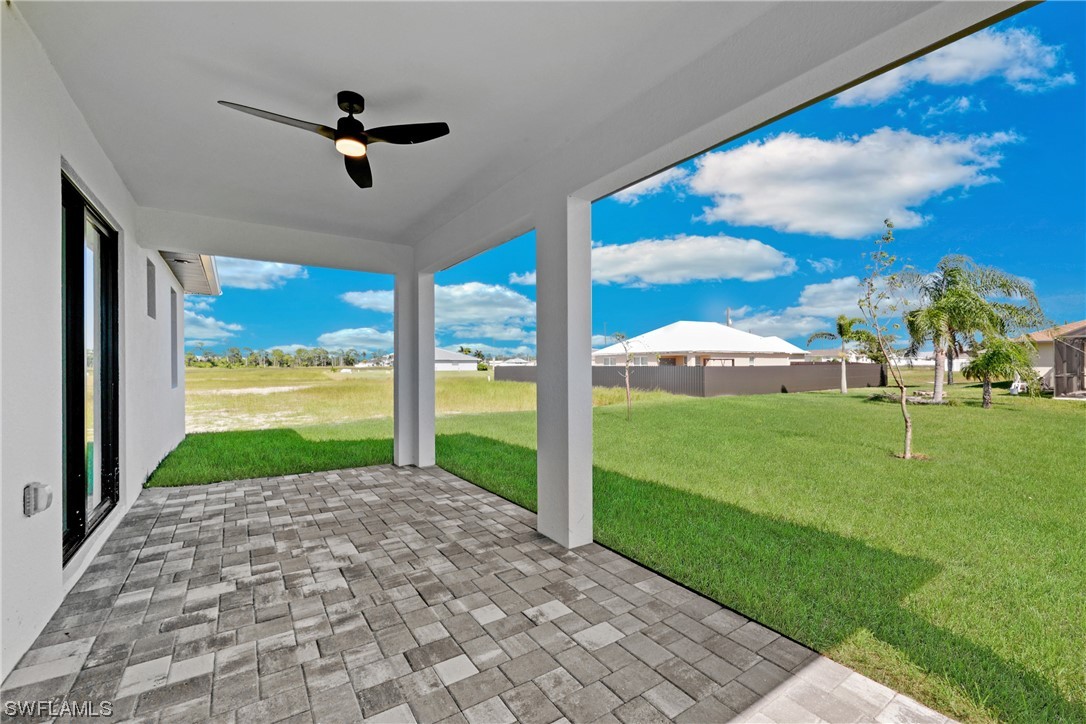 2917 Nelson Road North Cape Coral, FL 33993 - Photo 22 of 25 a view of a porch and garden