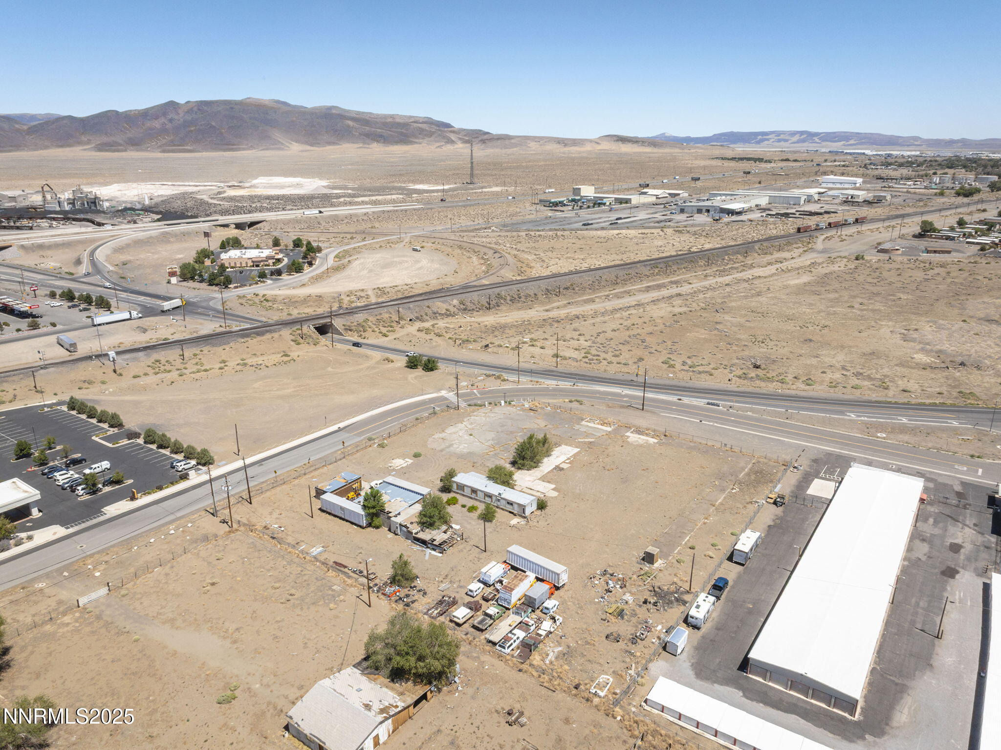 825 Mesa Drive Fernley, NV 89408 - Photo 16 of 20 a view of a terrace with wooden floor and mountain view