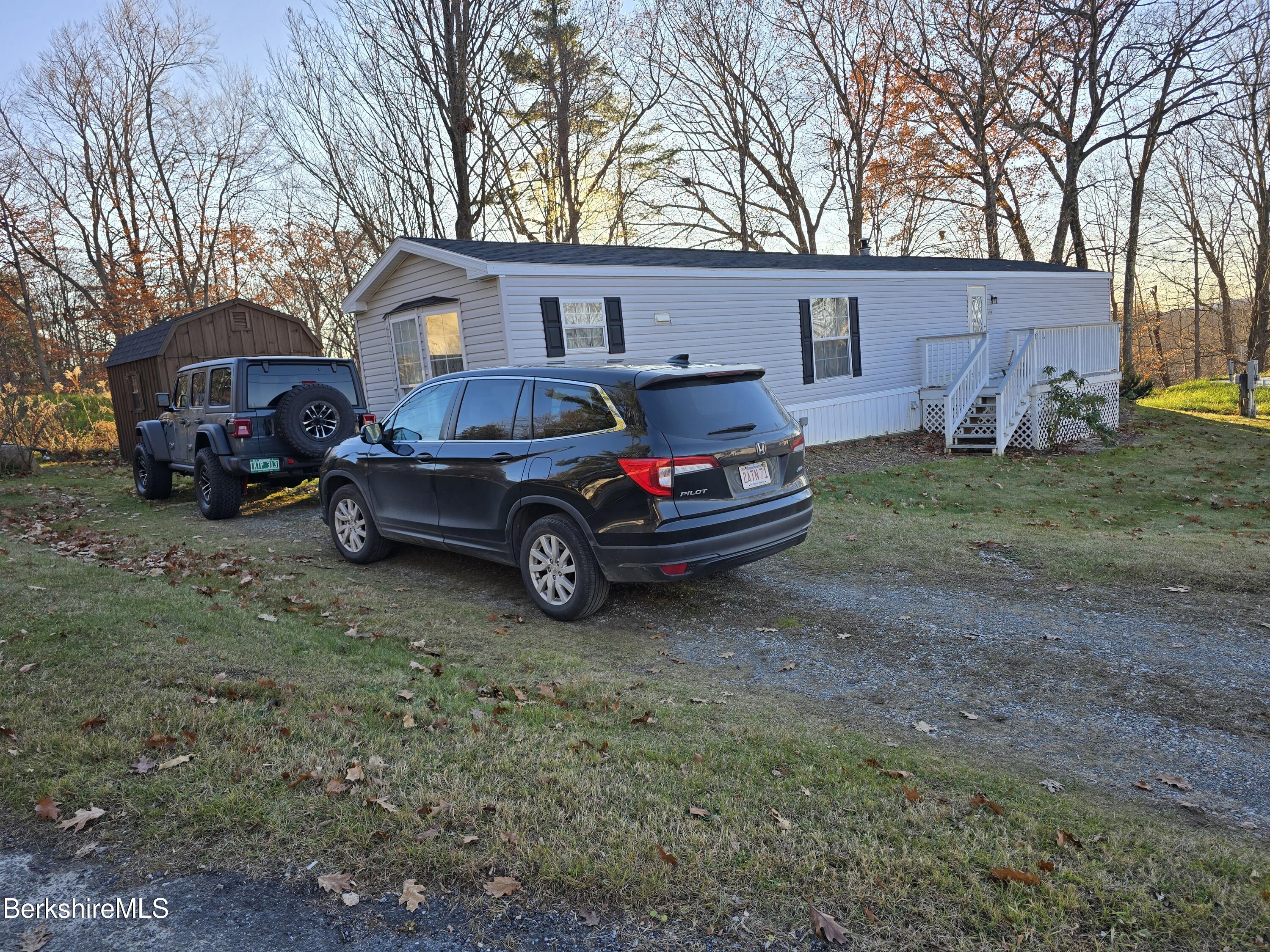 108 Baker Drive Bennington, VT 05201 - Photo 5 of 17 a house view with a outdoor space