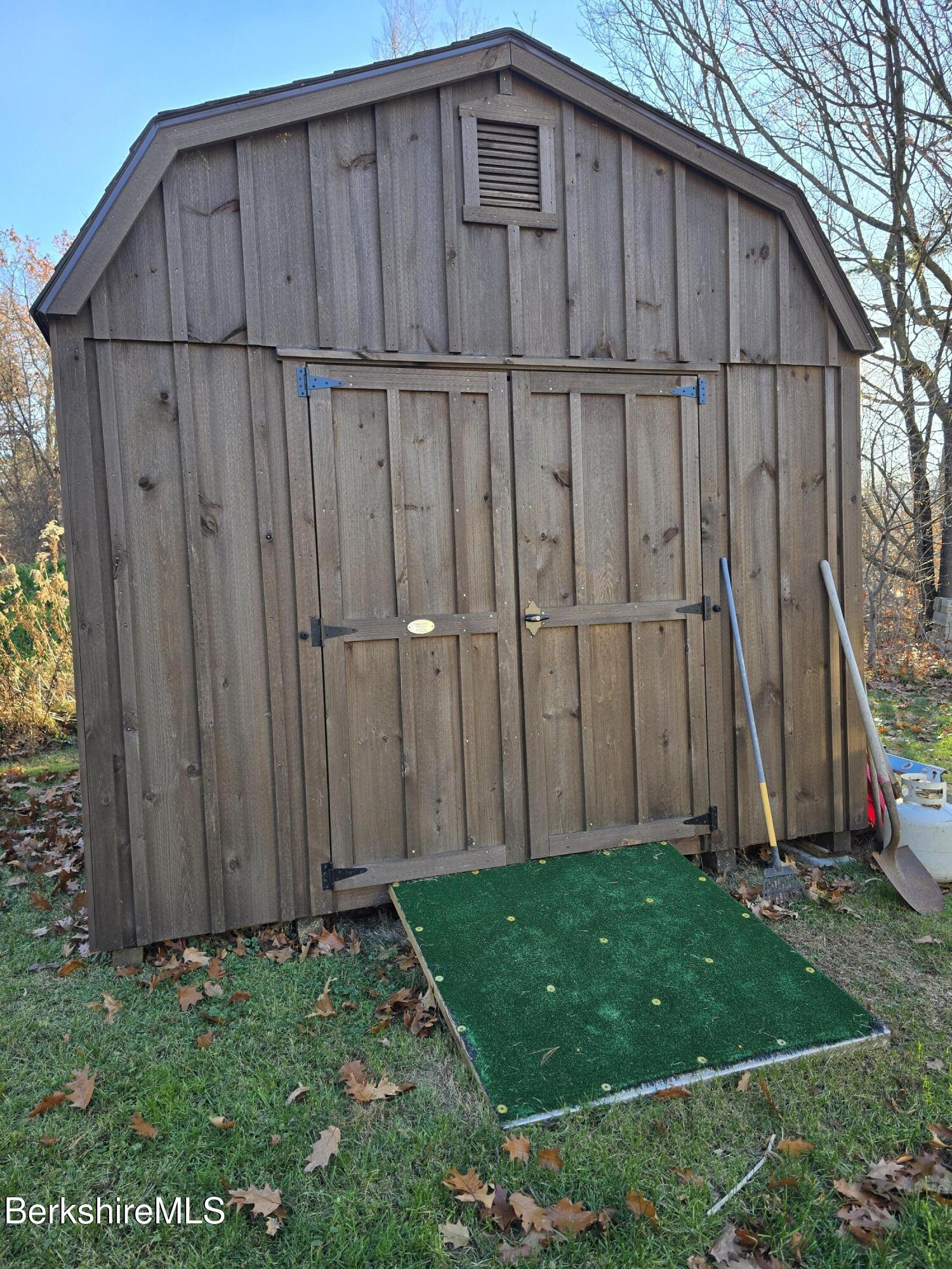 108 Baker Drive Bennington, VT 05201 - Photo 6 of 17 a wooden fence with a small yard
