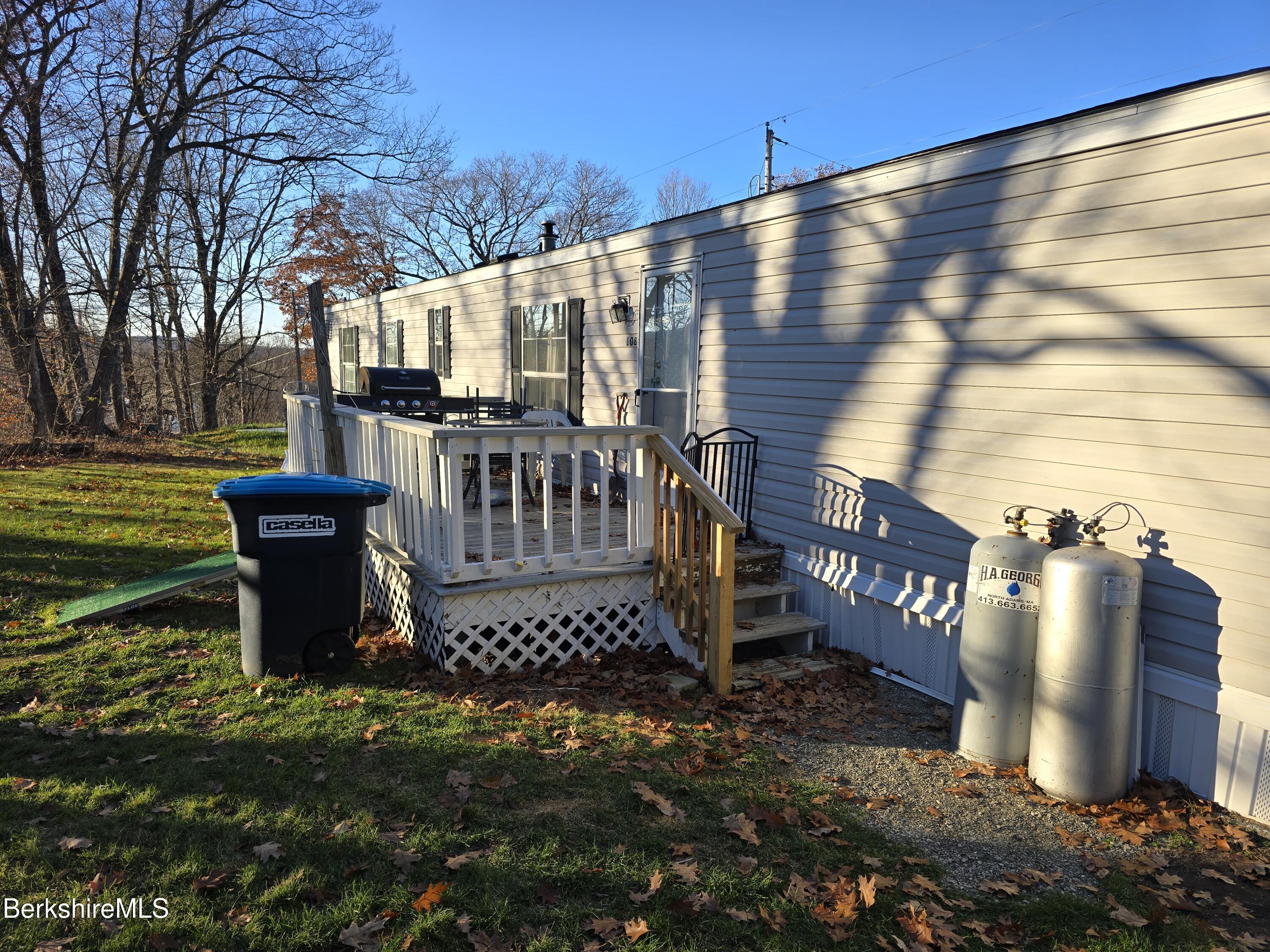 108 Baker Drive Bennington, VT 05201 - Photo 9 of 17 a view of a bench in the backyard