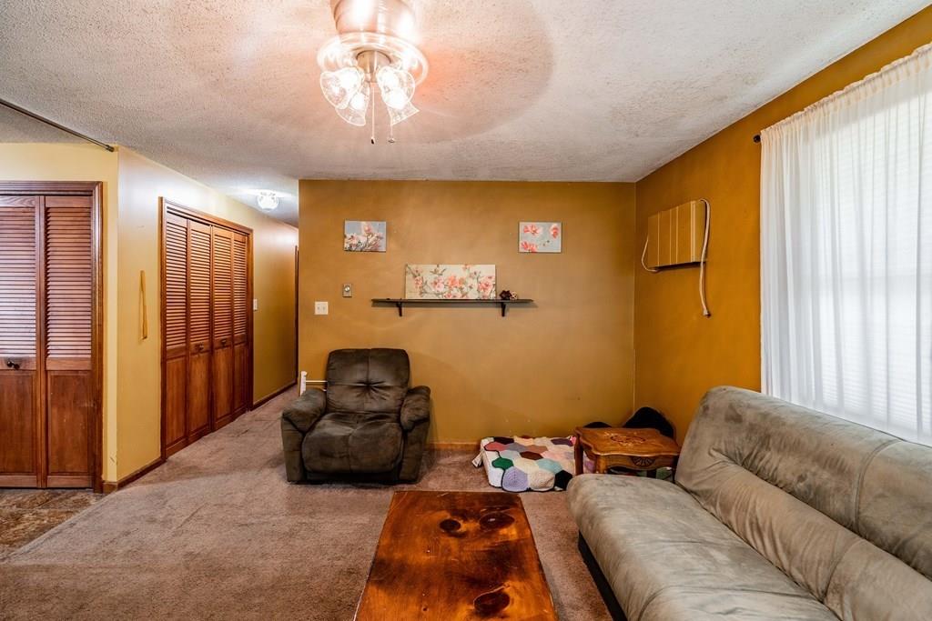 71 Ann Street Chicopee, MA 01020 - Photo 6 of 16 a livingroom with furniture and a window