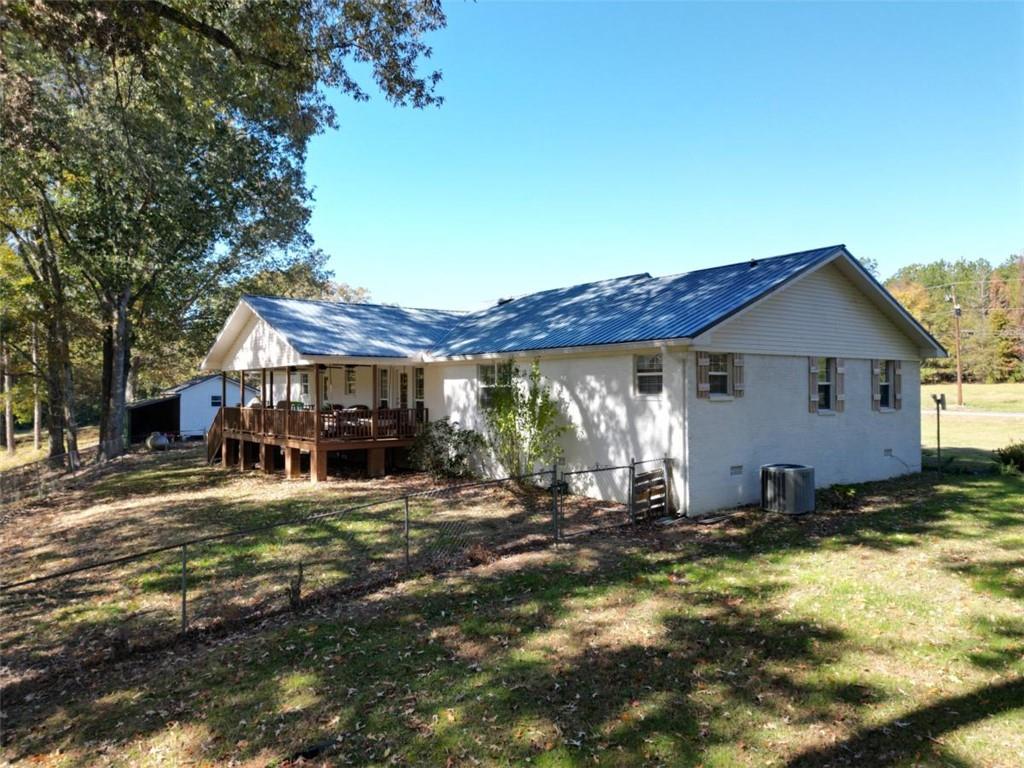 2053 Buttermilk Road Southwest Cave Spring, GA 30124 - Photo 12 of 50 a view of a house with backyard