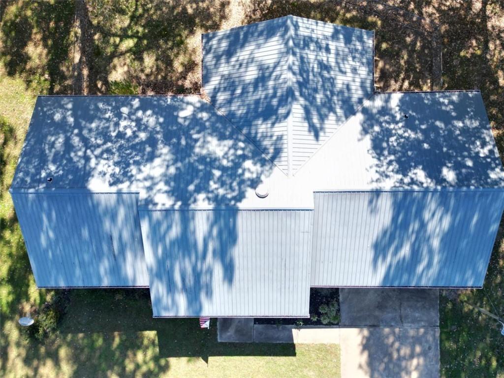 2053 Buttermilk Road Southwest Cave Spring, GA 30124 - Photo 14 of 50 a backyard of a house with lots of green space