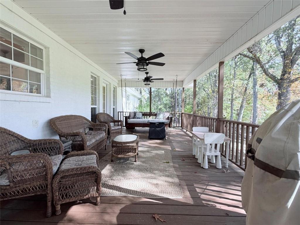 2053 Buttermilk Road Southwest Cave Spring, GA 30124 - Photo 16 of 69 a living room with furniture and wooden floor