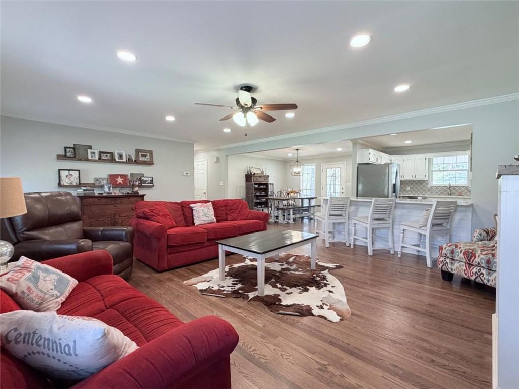 2053 Buttermilk Road Southwest Cave Spring, GA 30124 - Photo 21 of 69 a living room with furniture and wooden floor