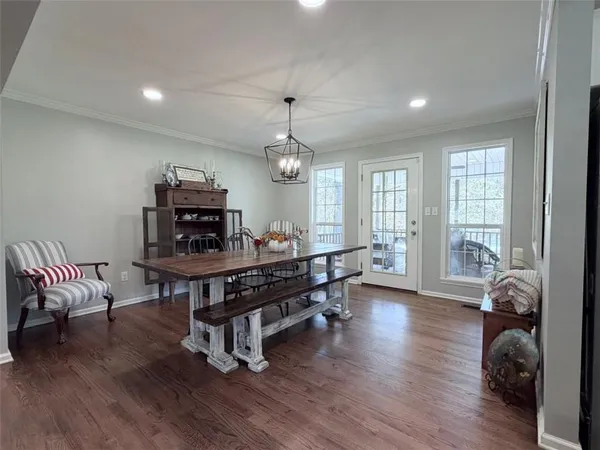 a kitchen with stainless steel appliances a refrigerator sink and cabinets