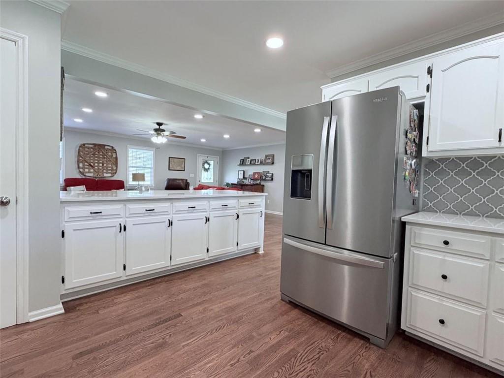 2053 Buttermilk Road Southwest Cave Spring, GA 30124 - Photo 29 of 69 a kitchen with stainless steel appliances a refrigerator sink and cabinets