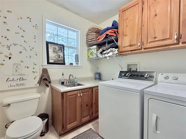 a bathroom with a sink a mirror and a shower