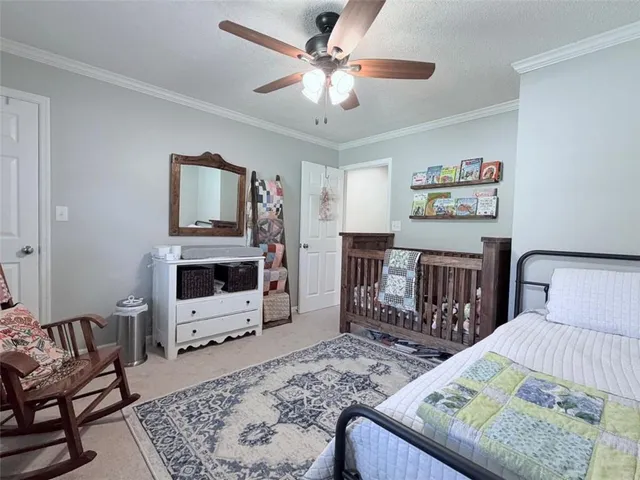 a bed room with a bed and furniture