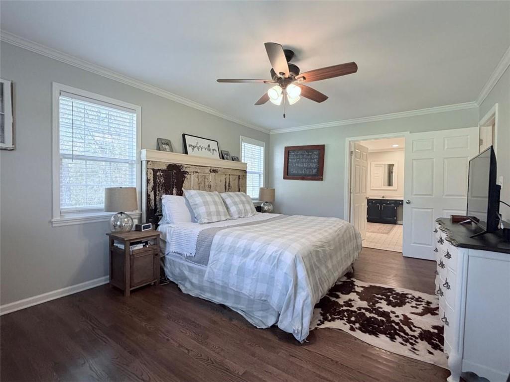 2053 Buttermilk Road Southwest Cave Spring, GA 30124 - Photo 42 of 50 a bedroom with a bed and a flat screen tv
