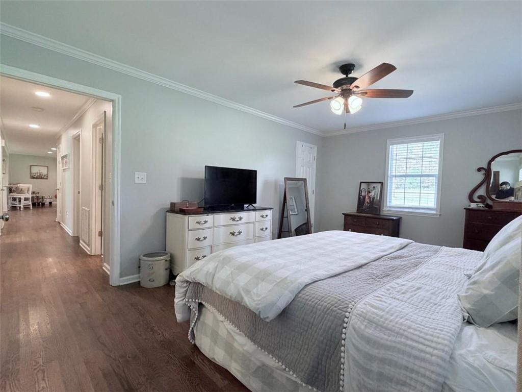 2053 Buttermilk Road Southwest Cave Spring, GA 30124 - Photo 45 of 69 a bedroom with a bed and a flat screen tv