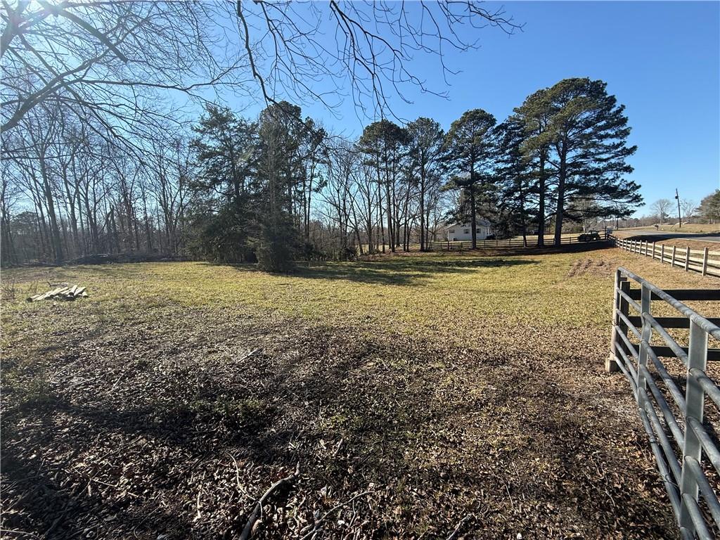 2053 Buttermilk Road Southwest Cave Spring, GA 30124 - Photo 56 of 69 a view of a yard with large trees
