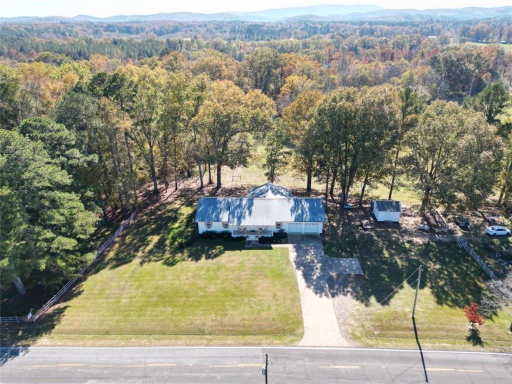 2053 Buttermilk Road Southwest Cave Spring, GA 30124 - Photo 6 of 50 an aerial view of a house with a yard