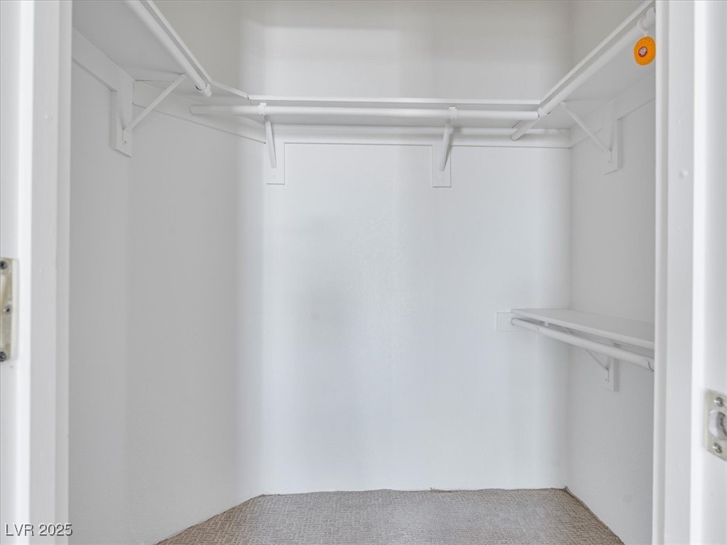 70 West Bonanza Road Las Vegas, NV 89124 - Photo 27 of 71 Walk in closet featuring carpet flooring