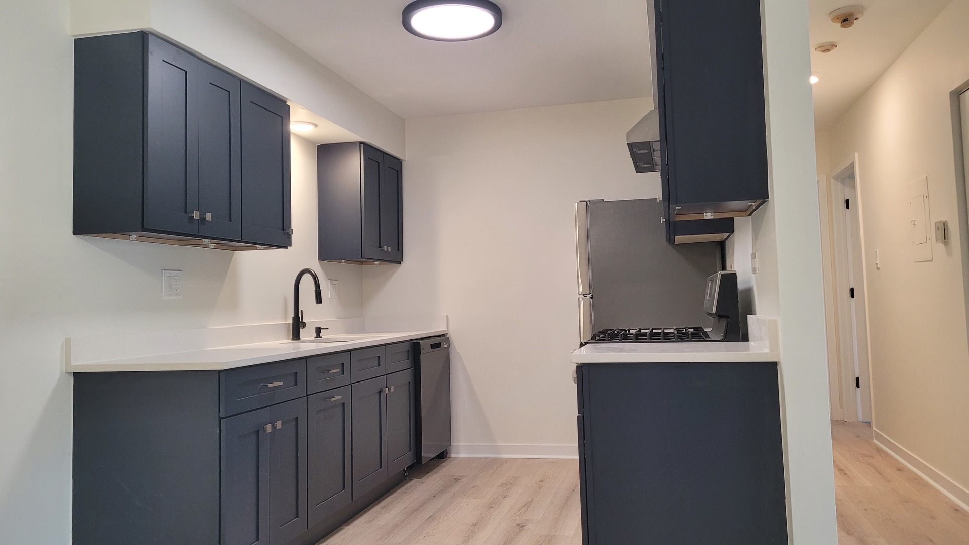 514 Kiowa Circle, Unit 204 Naperville, IL 60565 - Photo 2 of 8 a kitchen with stainless steel appliances granite countertop a sink stove and refrigerator