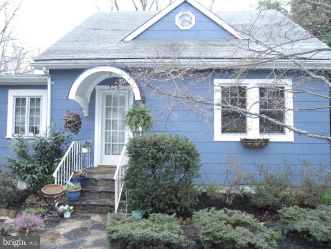 725 Hollen Road Baltimore, MD 21212 - Photo 1 of 12 a front view of a house with garden