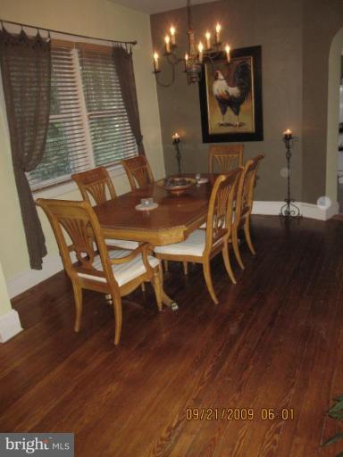 725 Hollen Road Baltimore, MD 21212 - Photo 3 of 12 a view of a dining room with furniture and wooden floor