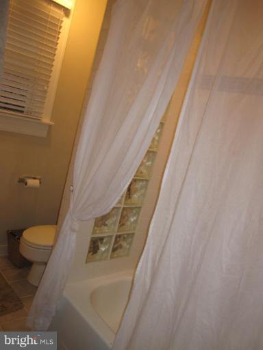 725 Hollen Road Baltimore, MD 21212 - Photo 9 of 12 a bathroom with a sink and a toilet