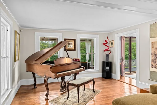 a living room with furniture and a window