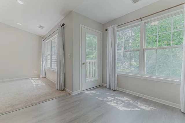 wooden floor and windows in an empty room