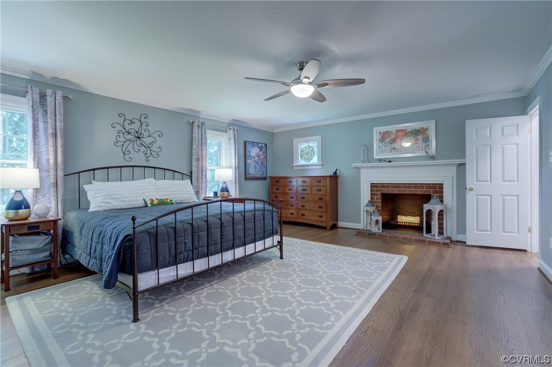 2615 Radstock Road Midlothian, VA 23113 - Photo 31 of 42 a bedroom with a bed and a fireplace