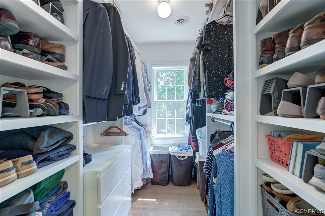 2615 Radstock Road Midlothian, VA 23113 - Photo 40 of 42 a view of walk in closet with clothes and shoes