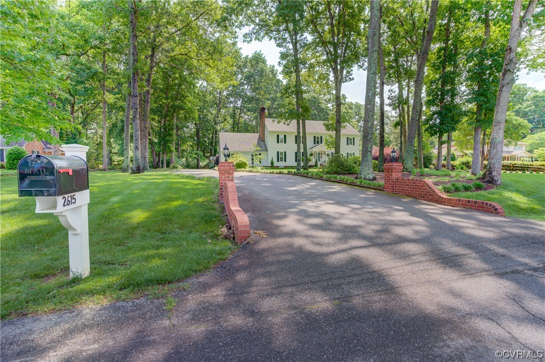 2615 Radstock Road Midlothian, VA 23113 - Photo 6 of 42 a view of a park with large trees