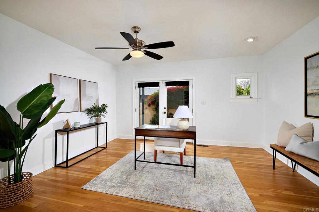 3252 Highland Drive Carlsbad, CA 92008 - Photo 22 of 55 a living room with furniture and a wooden floor