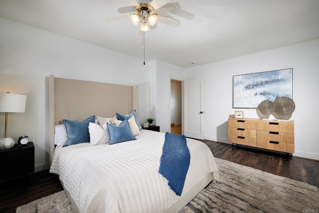 3252 Highland Drive Carlsbad, CA 92008 - Photo 26 of 55 a bedroom with a bed and a flat tv screen on dresser