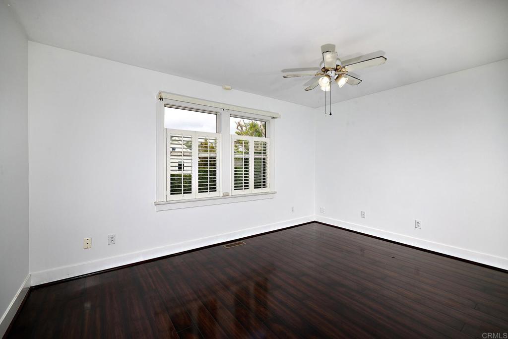 3252 Highland Drive Carlsbad, CA 92008 - Photo 30 of 55 a view of an empty room with wooden floor and a window