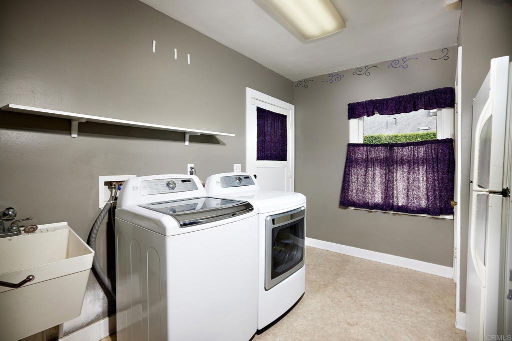 3252 Highland Drive Carlsbad, CA 92008 - Photo 31 of 55 a utility room with dryer and washer