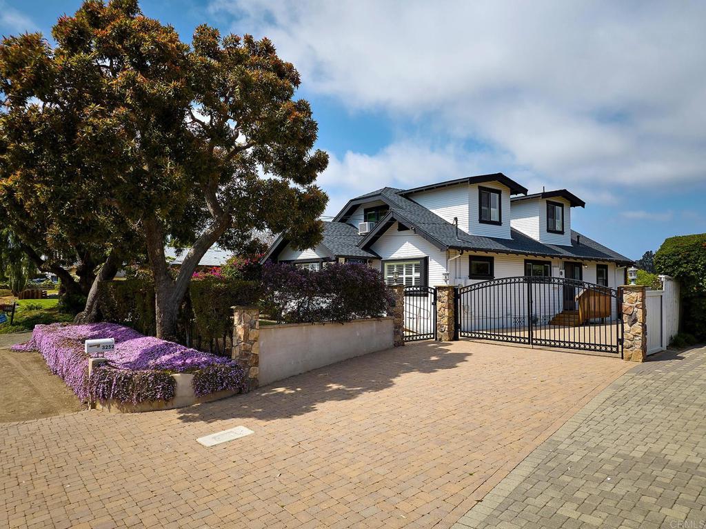 3252 Highland Drive Carlsbad, CA 92008 - Photo 39 of 55 a view of a street with a building in the background