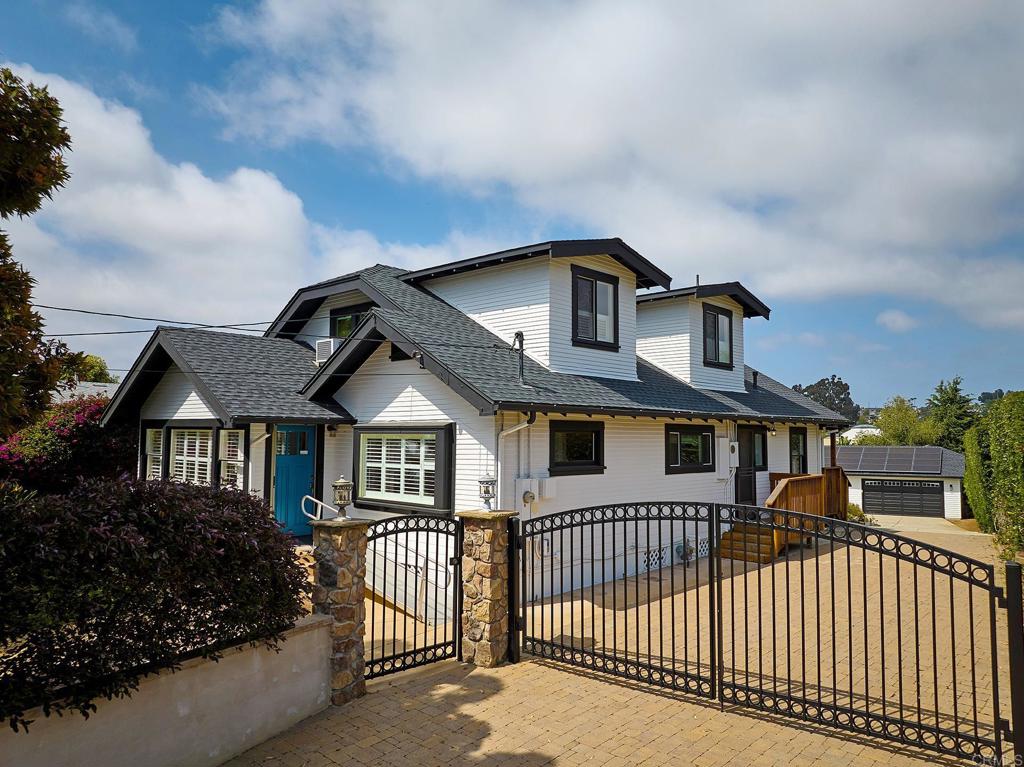 3252 Highland Drive Carlsbad, CA 92008 - Photo 4 of 55 a front view of a house with a yard