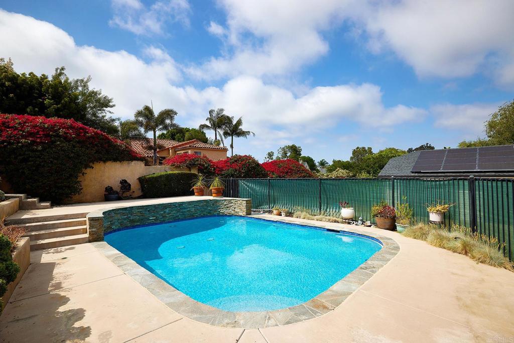 3252 Highland Drive Carlsbad, CA 92008 - Photo 55 of 55 a view of a swimming pool with a garden