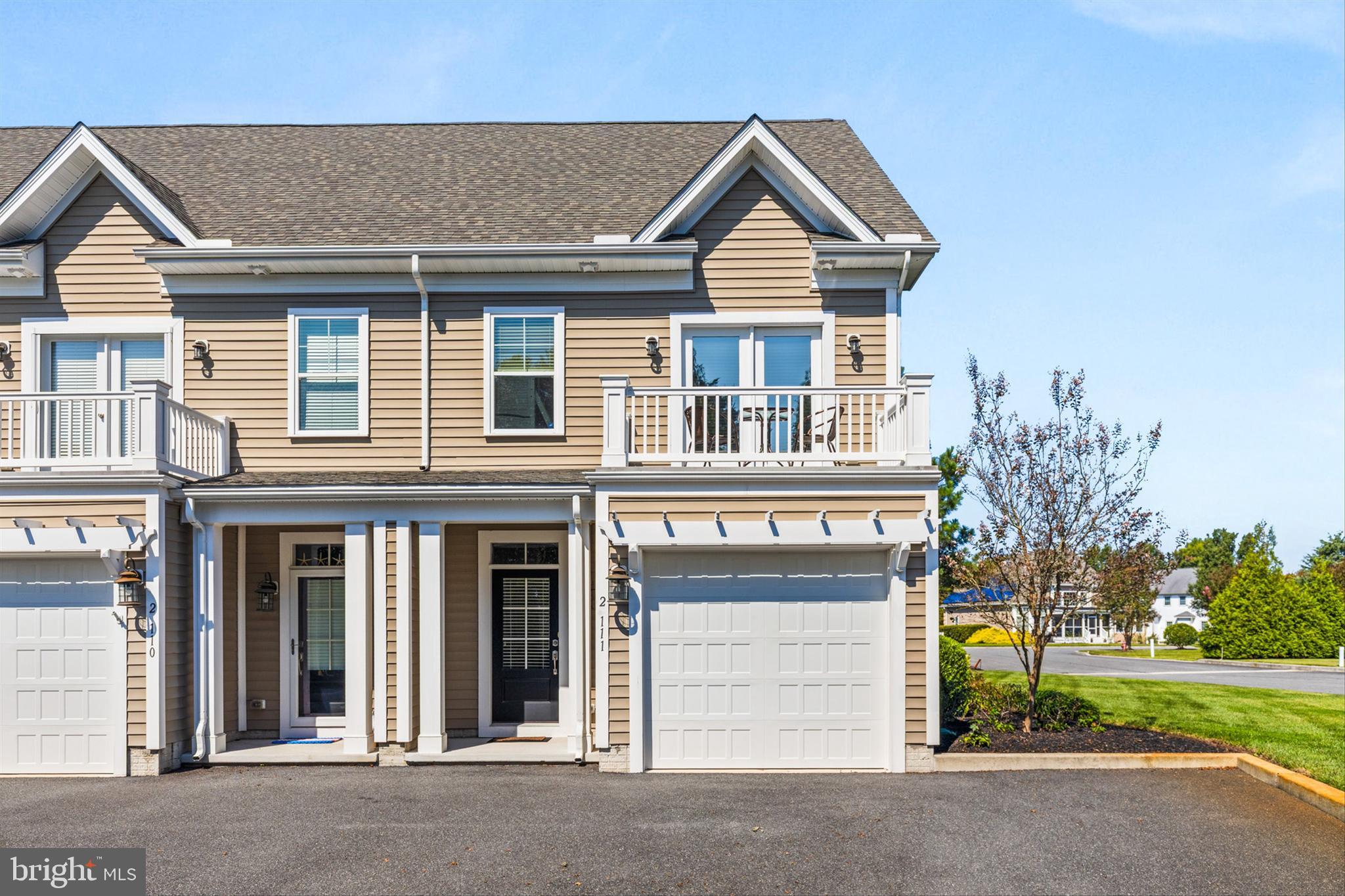 2 Smithfield Court, Unit 111 Ocean View, DE 19970 - Photo 1 of 32 front view of a house with a yard