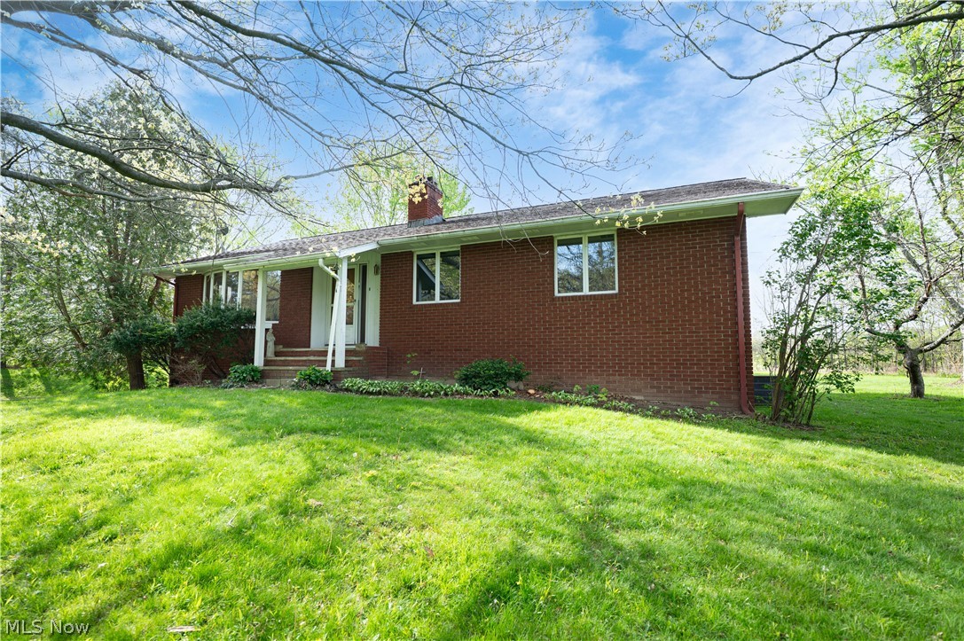12310 Huntoon Road Painesville, OH 44077 - Photo 48 of 48 Large front yard with this brick ranch set back nicely back from the street.....schedule a showing today!