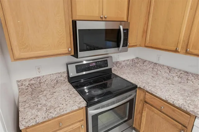 a view of room with window and hallway