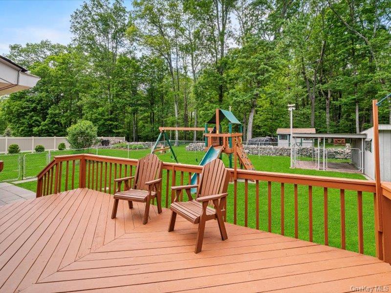 708 Kirbytown Road Middletown, NY 10940 - Photo 25 of 36 Deck With Fenced Yard, Swing Set, Shed